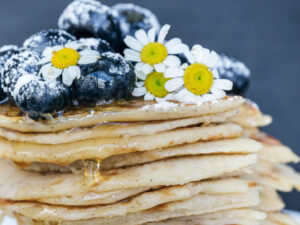 Blueberry Buttermilk Pancakes heather barnes f2dr5aplxx4 unsplash scaled